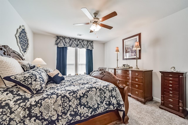 356 Selah Ct, Alvin, TX 77511 - bedroom featuring light colored carpet, a ceiling fan, and baseboards