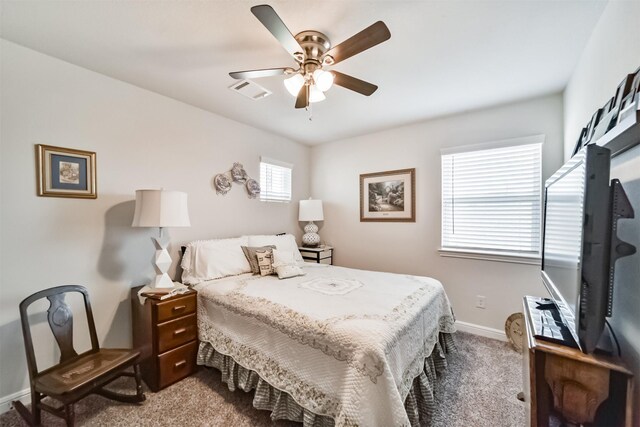 356 Selah Ct, Alvin, TX 77511 - carpeted bedroom featuring baseboards and a ceiling fan