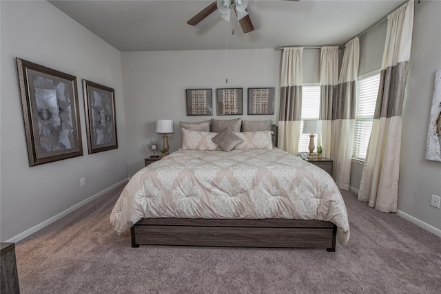 214 Emerald Thicket Ln, Humble, TX 77336 - carpeted bedroom featuring baseboards and a ceiling fan