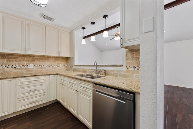 2510 Leichester Dr, Spring, TX 77386 - kitchen featuring dishwasher, a sink, backsplash, light stone counters, and vaulted ceiling