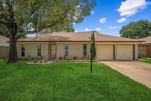 2510 Leichester Dr, Spring, TX 77386 - ranch-style home with an attached garage, driveway, and brick siding