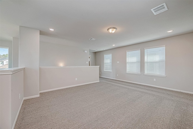 24705 Thornbluff Briar Trl, Huffman, TX 77336 - spare room featuring carpet floors, baseboards, and recessed lighting