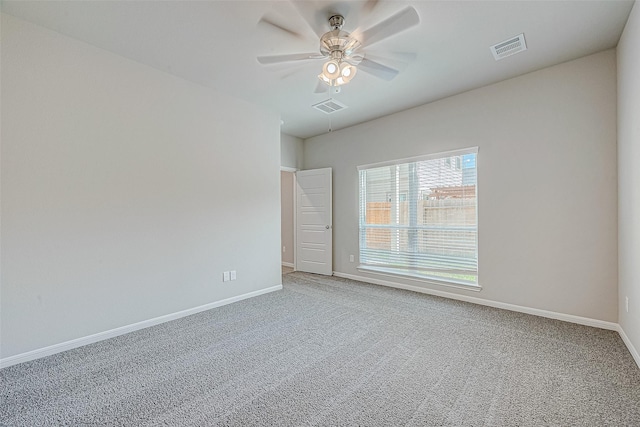 24705 Thornbluff Briar Trl, Huffman, TX 77336 - spare room with baseboards, ceiling fan, and carpet flooring