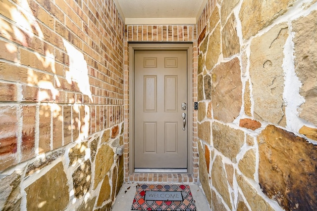 11210 Victoria Hollow Trce, Richmond, TX 77406 - doorway to property featuring brick siding