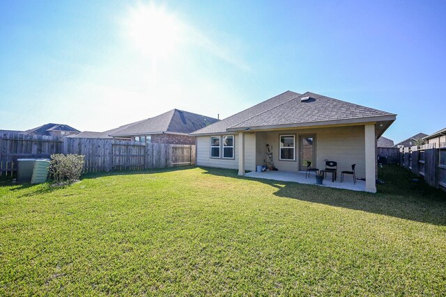 11210 Victoria Hollow Trce, Richmond, TX 77406 - rear view of house with a patio and a shingled roof