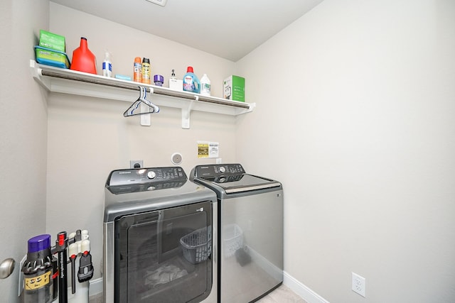 11210 Victoria Hollow Trce, Richmond, TX 77406 - laundry area featuring independent washer and dryer and baseboards