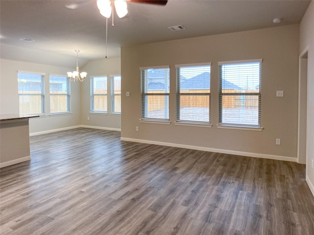 27203 Blue Pool Dr, Katy, TX 77493 - empty room featuring a chandelier, ceiling fan, dark wood-type flooring, baseboards, and lofted ceiling