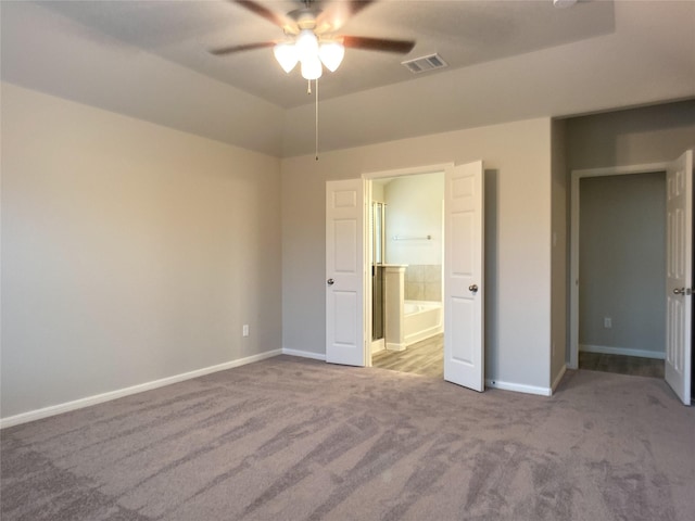 27203 Blue Pool Dr, Katy, TX 77493 - unfurnished bedroom with carpet, baseboards, ensuite bathroom, and ceiling fan