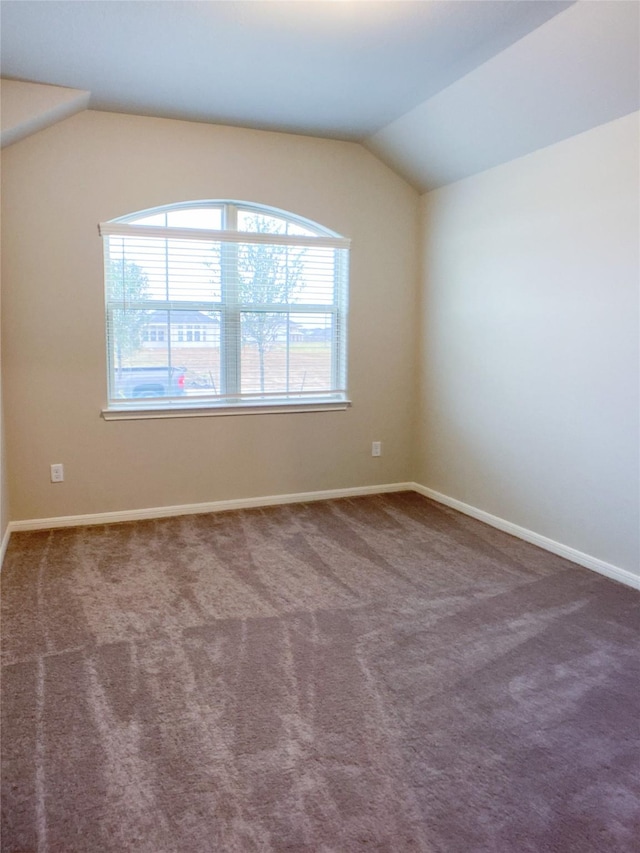 27203 Blue Pool Dr, Katy, TX 77493 - carpeted spare room featuring vaulted ceiling and baseboards