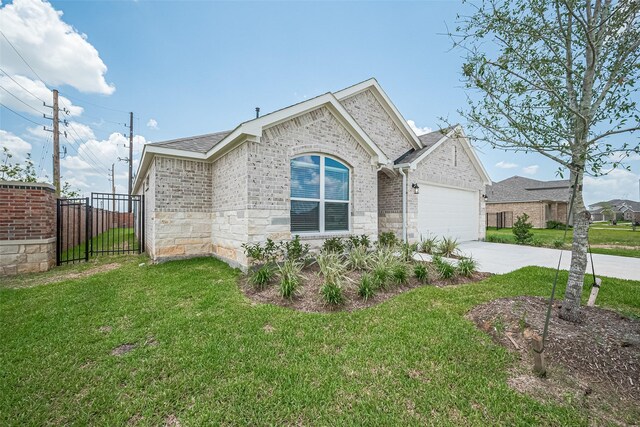 27203 Blue Pool Dr, Katy, TX 77493 - view of side of home with driveway, an attached garage, brick siding, and stone siding