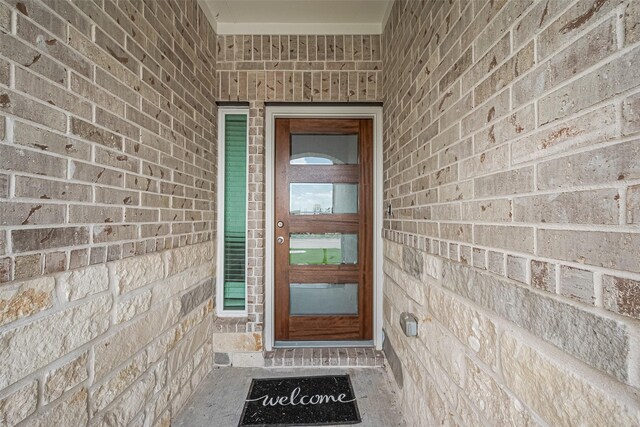 27203 Blue Pool Dr, Katy, TX 77493 - doorway to property featuring brick siding