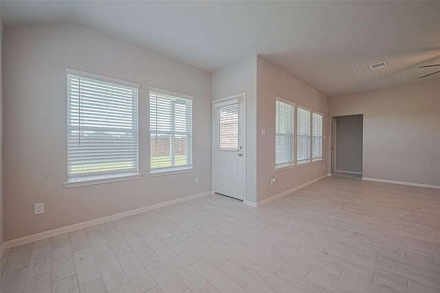 27203 Blue Pool Dr, Katy, TX 77493 - spare room with light wood-type flooring, a ceiling fan, and baseboards