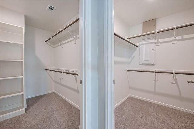 27203 Blue Pool Dr, Katy, TX 77493 - spacious closet featuring carpet flooring and electric panel