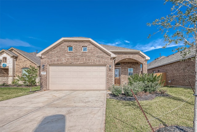 1464 Sundown Glen Ln, Katy, TX 77493 - french country inspired facade with brick siding, driveway, an attached garage, a front lawn, and a shingled roof