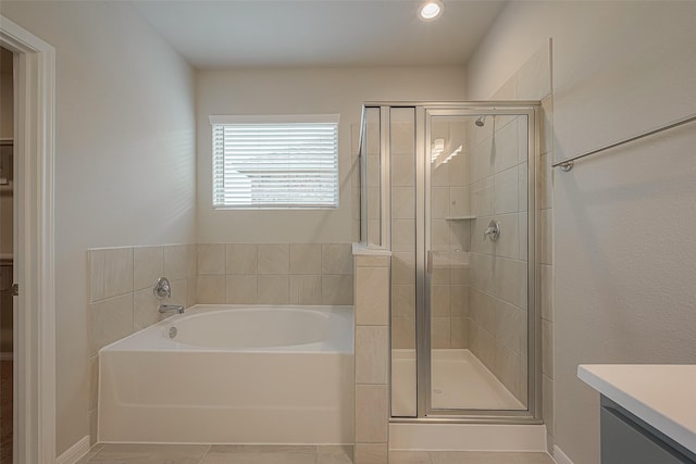 1464 Sundown Glen Ln, Katy, TX 77493 - full bathroom featuring a bath, a stall shower, vanity, baseboards, and recessed lighting