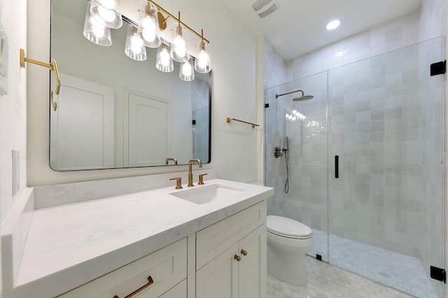 4528 S Evergreen St, Bellaire, TX 77401 - bathroom with vanity, a shower stall, toilet, recessed lighting, and tile patterned flooring