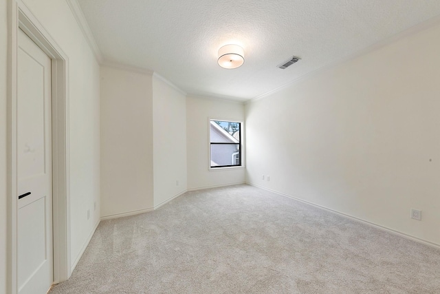 4528 S Evergreen St, Bellaire, TX 77401 - empty room with light colored carpet, crown molding, a textured ceiling, and baseboards