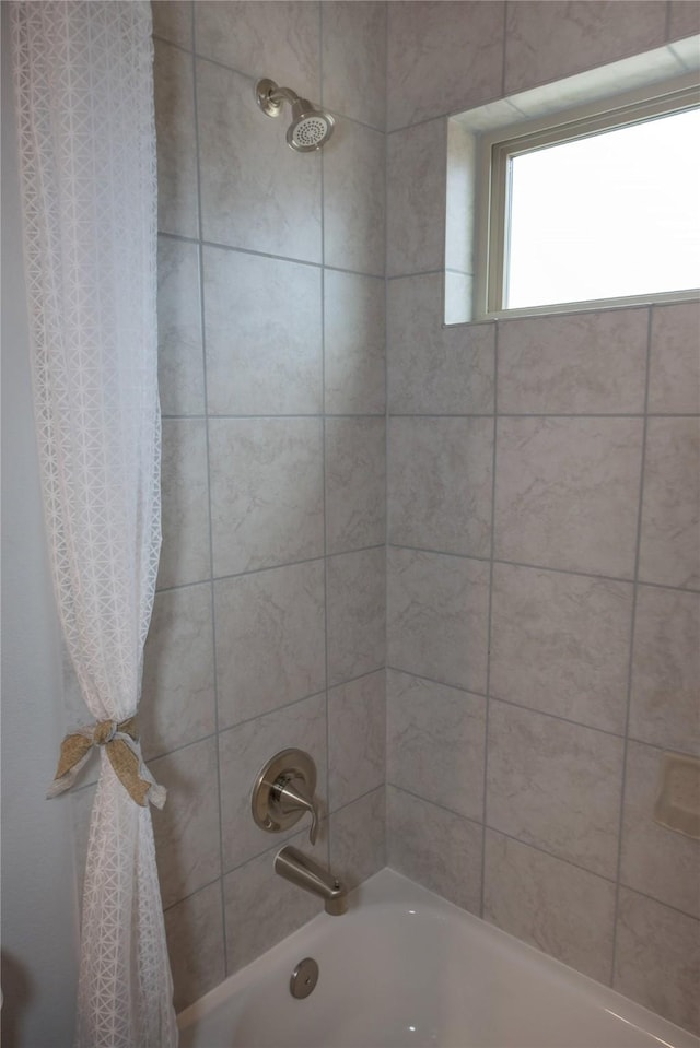 1472 Sundown Gln, Katy, TX 77493 - bathroom with shower / bath combo with shower curtain
