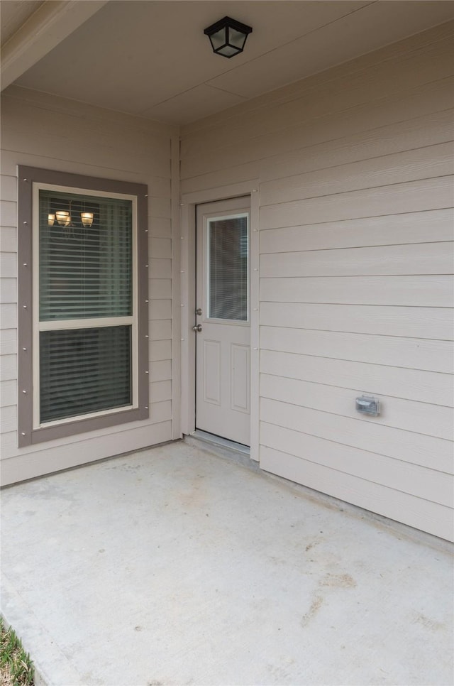 1472 Sundown Gln, Katy, TX 77493 - view of exterior entry with a patio