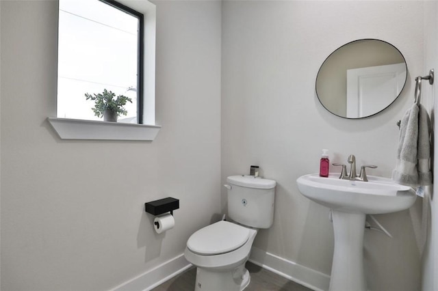 4104 Marina St, Houston, TX 77007 - bathroom with baseboards and wood finished floors