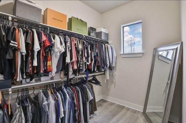 4104 Marina St, Houston, TX 77007 - walk in closet with wood finished floors