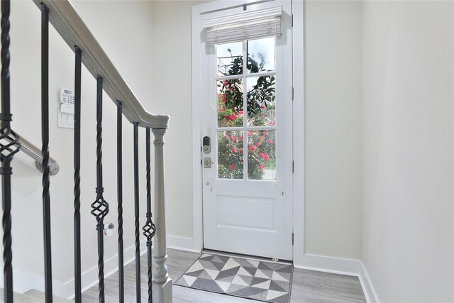 4104 Marina St, Houston, TX 77007 - entrance foyer featuring wood finished floors and stairs