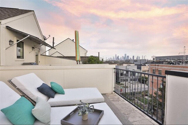 4104 Marina St, Houston, TX 77007 - balcony at dusk featuring a skyline view