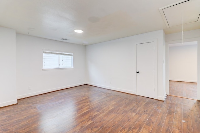 19603 Green Chase Ln, Houston, TX 77073 - unfurnished bedroom with attic access, wood finished floors, and a ceiling fan