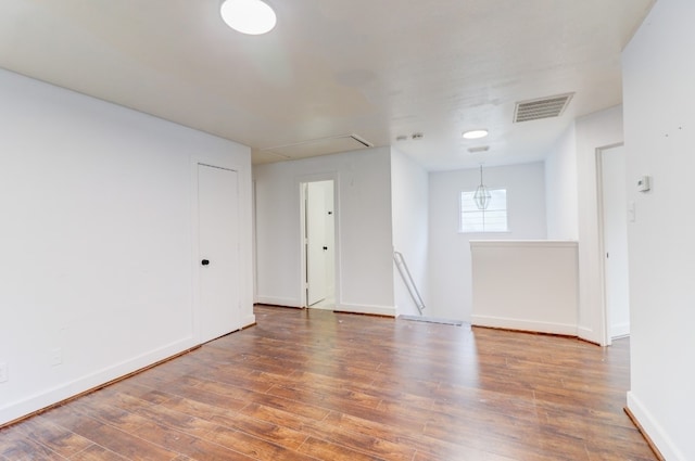 19603 Green Chase Ln, Houston, TX 77073 - spare room with attic access and wood finished floors