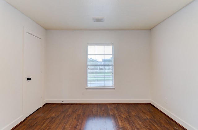 19603 Green Chase Ln, Houston, TX 77073 - empty room with dark wood finished floors and baseboards