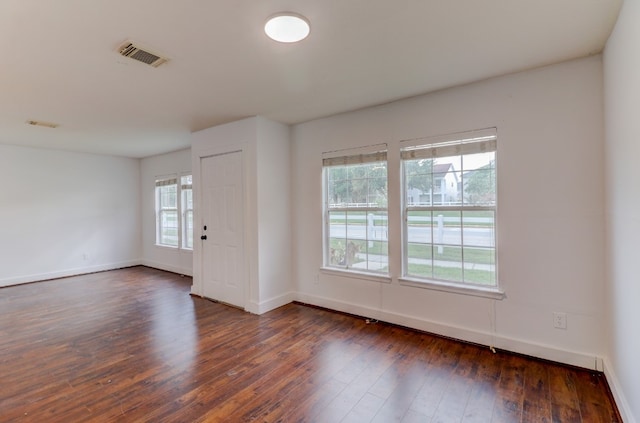 19603 Green Chase Ln, Houston, TX 77073 - empty room with dark wood-type flooring and baseboards