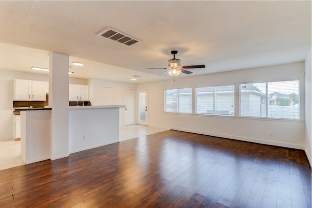 19603 Green Chase Ln, Houston, TX 77073 - unfurnished living room featuring a ceiling fan, wood finished floors, and recessed lighting