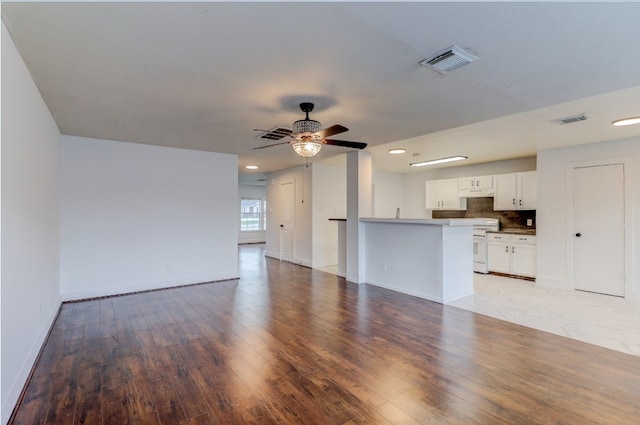 19603 Green Chase Ln, Houston, TX 77073 - unfurnished living room featuring light wood finished floors, a ceiling fan, and recessed lighting