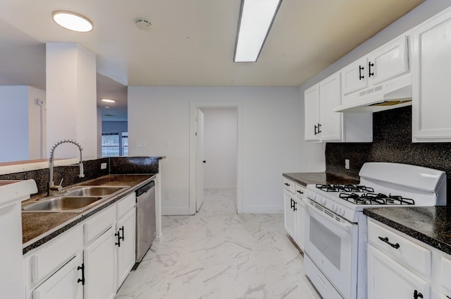 19603 Green Chase Ln, Houston, TX 77073 - kitchen with gas range gas stove, under cabinet range hood, stainless steel dishwasher, light marble finish flooring, and backsplash