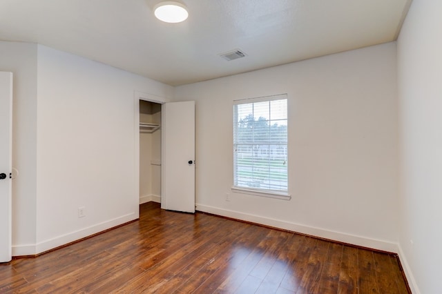 19603 Green Chase Ln, Houston, TX 77073 - unfurnished bedroom with hardwood / wood-style floors and a closet