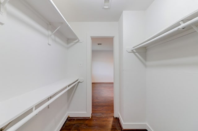 19603 Green Chase Ln, Houston, TX 77073 - spacious closet featuring dark wood-style flooring