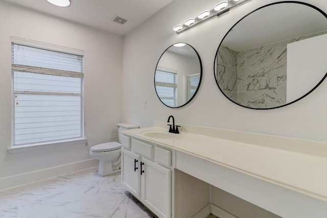 19603 Green Chase Ln, Houston, TX 77073 - bathroom featuring marble look tiles, vanity, and a shower