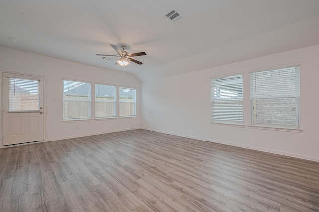 17807 Cappadocia Trl, Tomball, TX 77377 - unfurnished room featuring ceiling fan, wood finished floors, and lofted ceiling