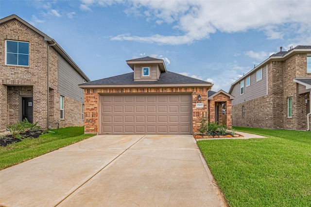 17807 Cappadocia Trl, Tomball, TX 77377 - traditional-style home featuring brick siding, a front lawn, and concrete driveway