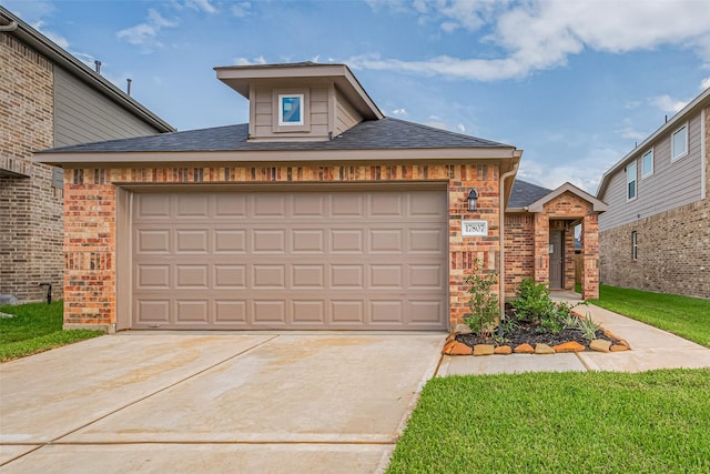 17807 Cappadocia Trl, Tomball, TX 77377 - view of front facade featuring brick siding, concrete driveway, an attached garage, and roof with shingles