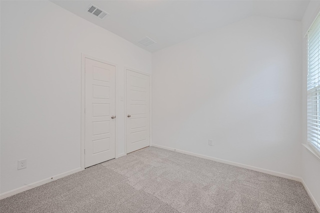 17807 Cappadocia Trl, Tomball, TX 77377 - empty room with light carpet and vaulted ceiling