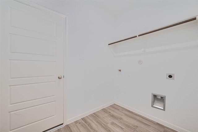 17807 Cappadocia Trl, Tomball, TX 77377 - washroom featuring electric dryer hookup, gas dryer hookup, light wood-style floors, and hookup for a washing machine