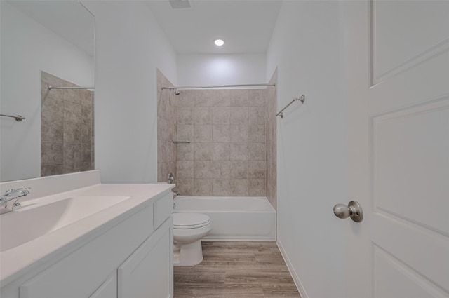 17807 Cappadocia Trl, Tomball, TX 77377 - full bathroom featuring vanity, wood finished floors, and  shower combination