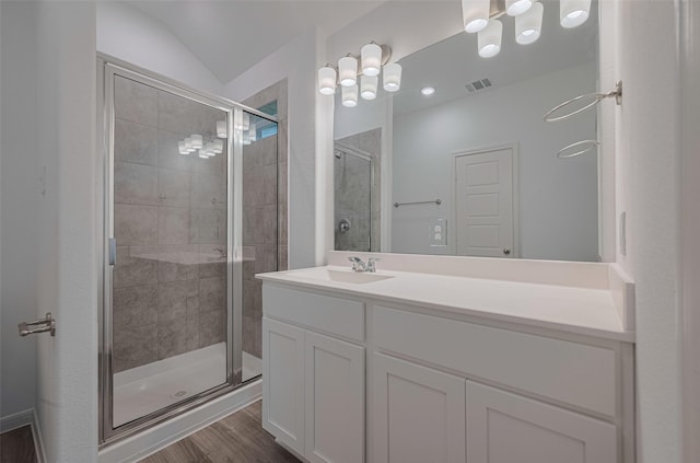 17807 Cappadocia Trl, Tomball, TX 77377 - full bathroom featuring vanity, a shower stall, and wood finished floors