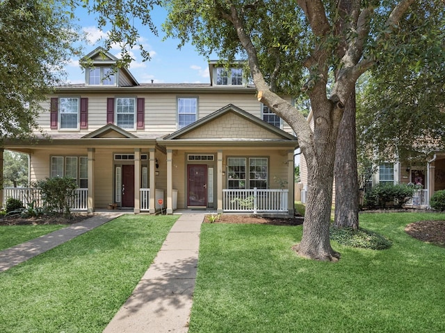 23807 Township Elm St, Spring, TX 77373 - view of front of property featuring a porch and a front yard