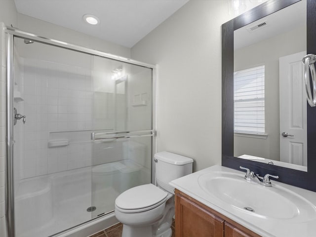 23807 Township Elm St, Spring, TX 77373 - bathroom featuring a stall shower, toilet, and vanity