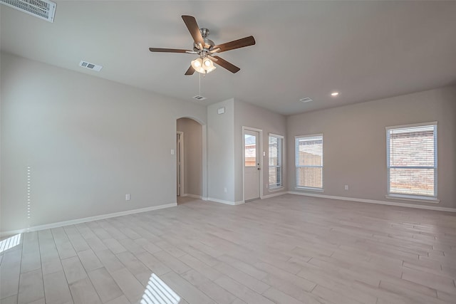 22807 Ephesus Ave, Tomball, TX 77377 - empty room with a ceiling fan, light wood-type flooring, baseboards, and recessed lighting