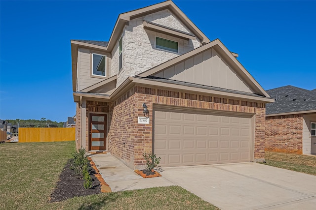 22807 Ephesus Ave, Tomball, TX 77377 - view of front of property with brick siding, board and batten siding, and concrete driveway