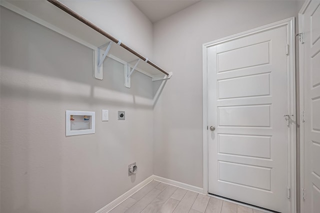 22807 Ephesus Ave, Tomball, TX 77377 - washroom featuring hookup for an electric dryer, washer hookup, and baseboards