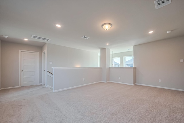 22807 Ephesus Ave, Tomball, TX 77377 - spare room with light carpet, baseboards, and recessed lighting